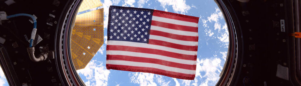 NASA astronaut Jack Fischer took this photograph of an American flag in one of the windows of the International Space Station's cupola, a dome-shaped module through which operations on the outside of the station can be observed and guided. Throughout NASA's history, spacecraft and launch vehicles have always been decorated with flags.(NASA)