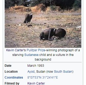 baby and vulture photograph