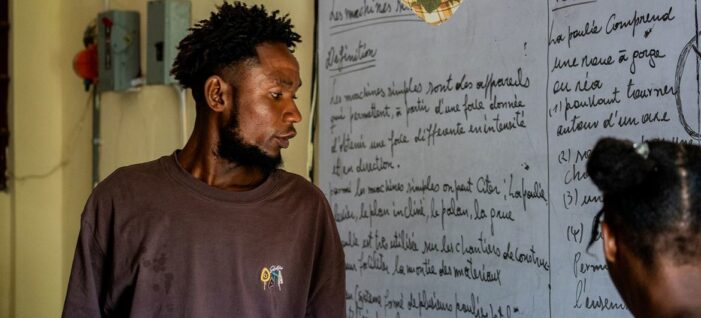 Desks become beds as Haitian school shelters people displaced by violence