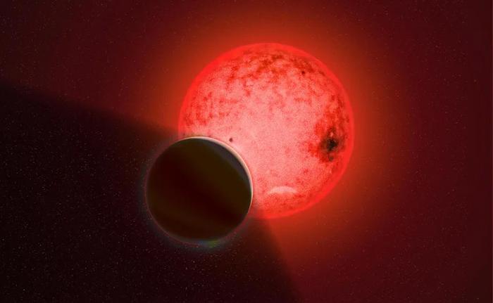 TOI-5205 b Exoplanet Around Red Dwarf Reveals Unusual Atmosphere: JWST Study